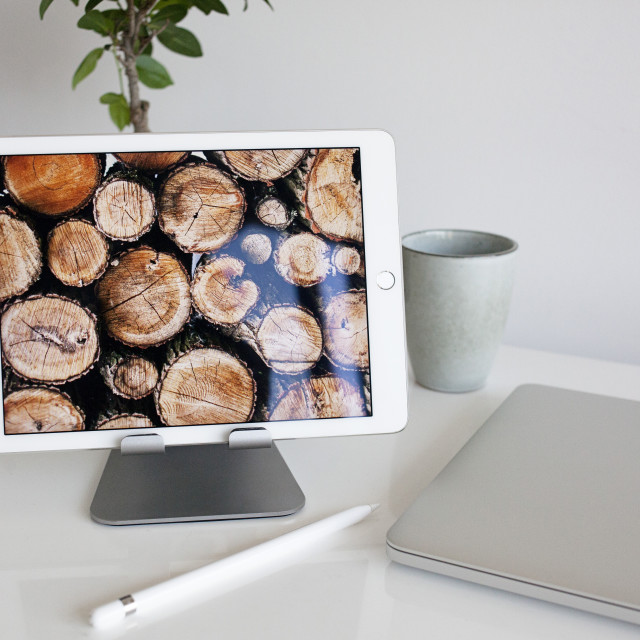 "Workspace with laptop, ipad and mug of coffee" stock image