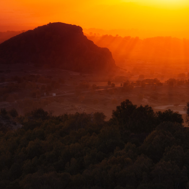 "Sunrise over a hill" stock image