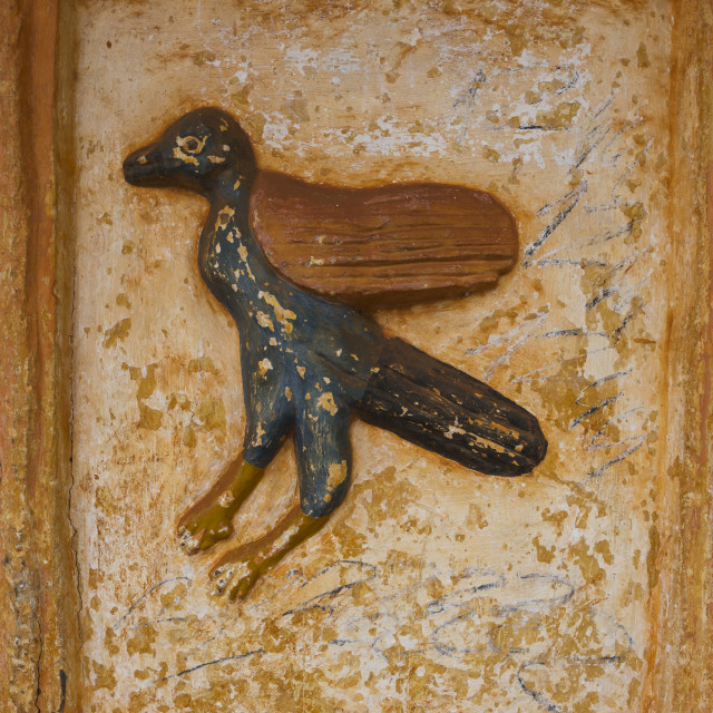 "Benin, West Africa, Abomey, bird on a bas-relief at agoli-agbo former palace" stock image