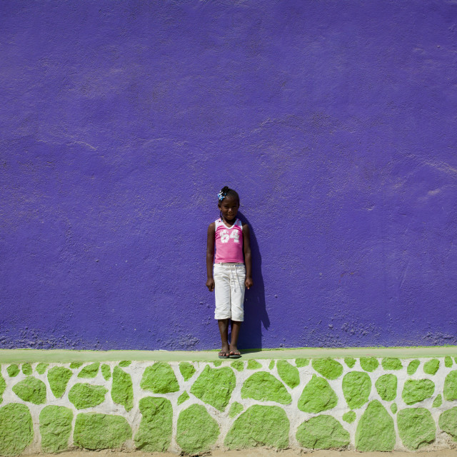 "Girl In Front Of A Purple Wall In Namibe Town, Angola" stock image
