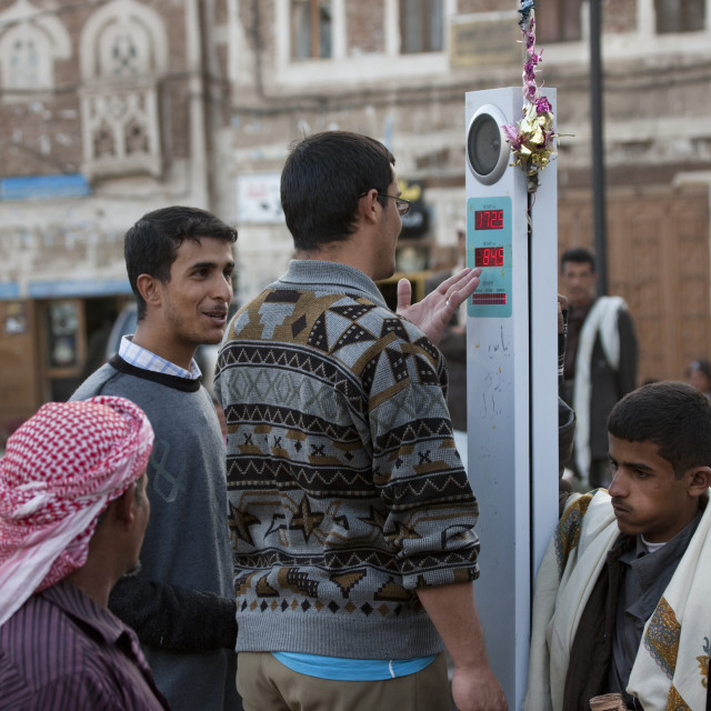 "Men Weighing Themselves In Sanaa Souq, Yemen" stock image