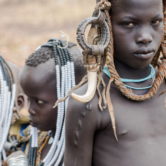 "Mursi tribe children with adornments on the heads, Omo valley, Mago park,..." stock image