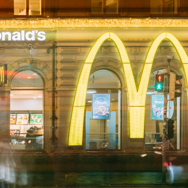 "Helsinki, Finland. Big Logo Of Mcdonalds Restaurant Cafe In Old Building In..." stock image