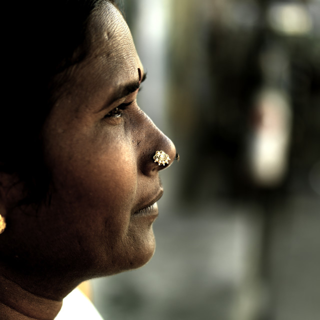 "Close Up Of A Woman With Nose Piercings And Bindi Looking Away, Pondicherry,..." stock image
