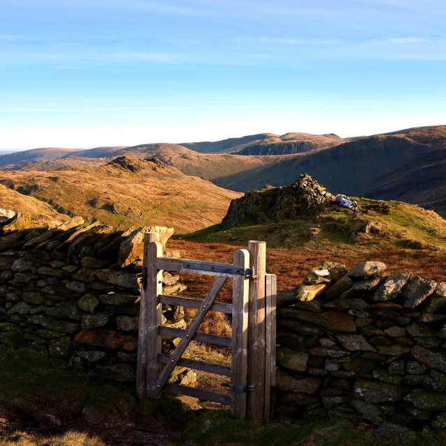 "Wooden gate and the summit of High Pike" stock image