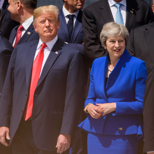 "Donald Trump and Theresa May, during Official opening ceremony of NATO SUMMIT 2018." stock image