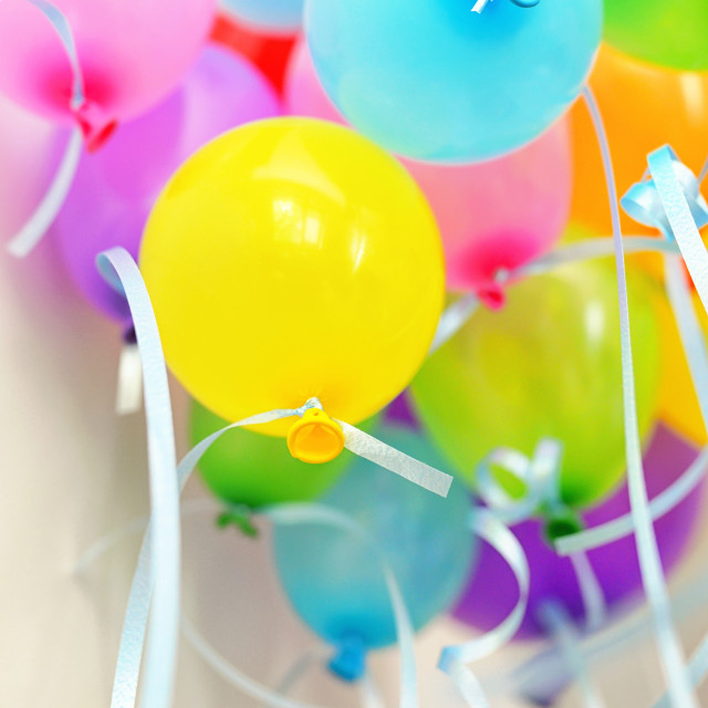 "Bunch of floating colored balloons and strings" stock image