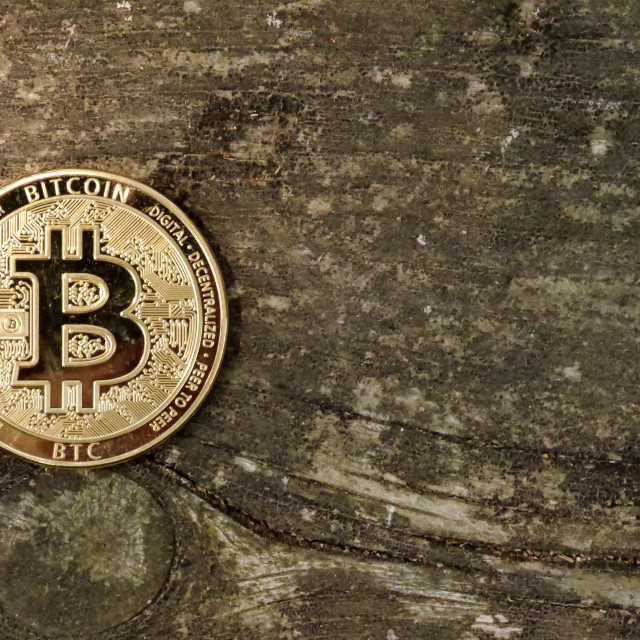 "Bitcoin coin on wooden background" stock image