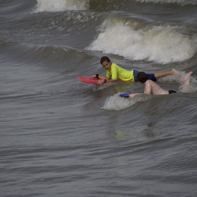 "Riding the waves" stock image