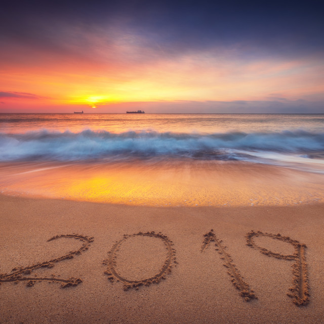 "Happy New Year 2019 concept on the sea beach; sunrsie shot" stock image