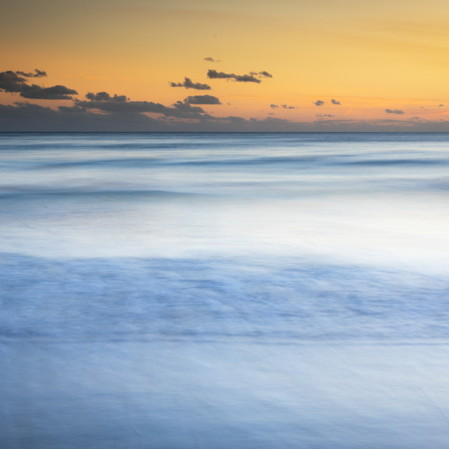 "Golden hour, Long exposure looking out to sea" stock image