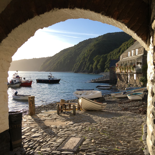 "Early morning in Clovelly harbour, Devon, England" stock image