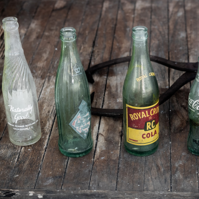 "VINTAGE SODA BOTTLES - ROYAL CROWN COLA, COCA COLA" by JOHN MOUNT - $25.14 "VINTAGE SODA BOTTLES - ROYAL CROWN COLA, COCA COLA" stock image