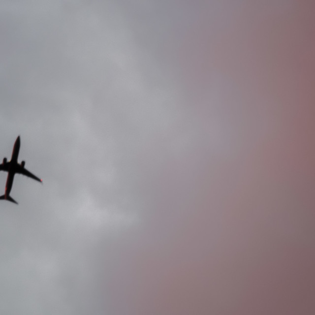 "AIRPLANE IN THE CLOUDS" by JOHN MOUNT - $25.14 "AIRPLANE IN THE CLOUDS" stock image