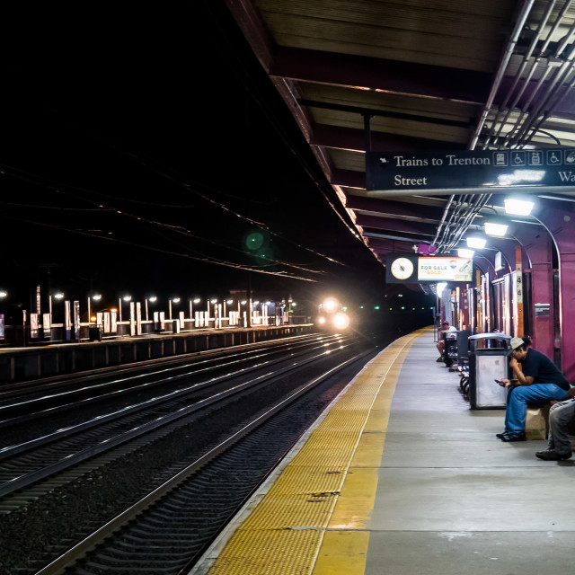 "A TRAIN APPROACHES THE STATION" by JOHN MOUNT - $25.14 "A TRAIN APPROACHES THE STATION" stock image