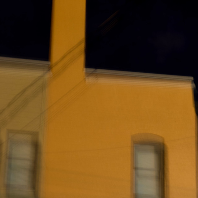"OUT OF FOCUS YELLOW BUILDING" by JOHN MOUNT - $25.14 "OUT OF FOCUS YELLOW BUILDING" stock image