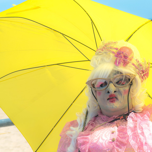 "ZOMBIE WITH YELLOW UMBRELLA" by JOHN MOUNT - $25.14 "ZOMBIE WITH YELLOW UMBRELLA" stock image