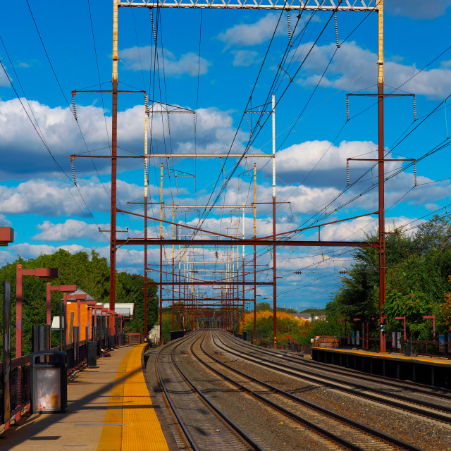 "Train tracks and blue sky" by JOHN MOUNT - $24.67 "Train tracks and blue sky" stock image