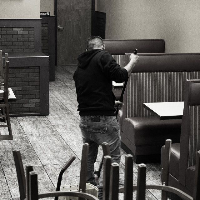 "Man sweeping up" by JOHN MOUNT - $24.67 "Man sweeping up" stock image