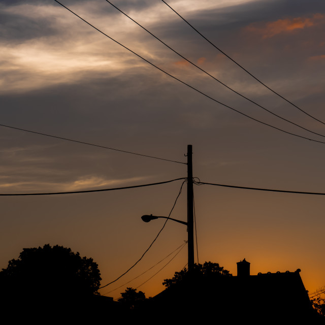 "Sunset sky with power lines" by JOHN MOUNT - $24.67 "Sunset sky with power lines" stock image