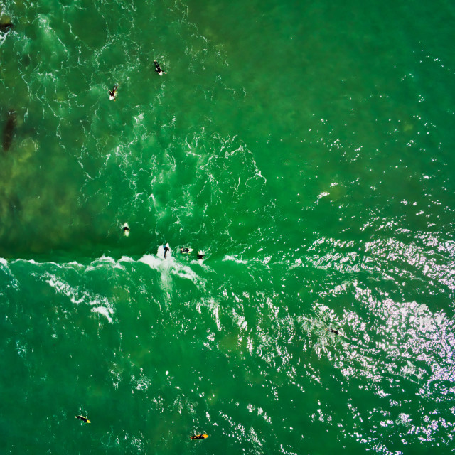 "Eagle view of surfers on water" stock image