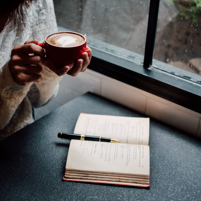 Woman Holding A Coffee Cup And Looking At The Window In Rainy Day License Download Or Print For 24 80 Photos Picfair