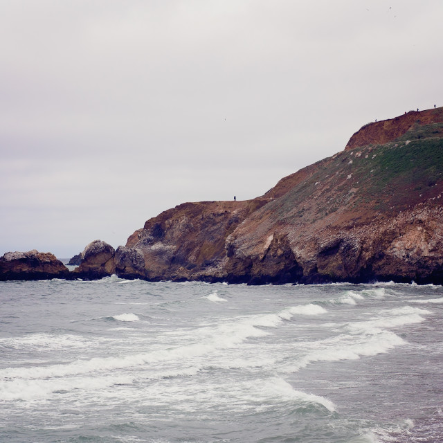 "People Hiking on Coastal Trail at Rockaway Beach, California" stock image