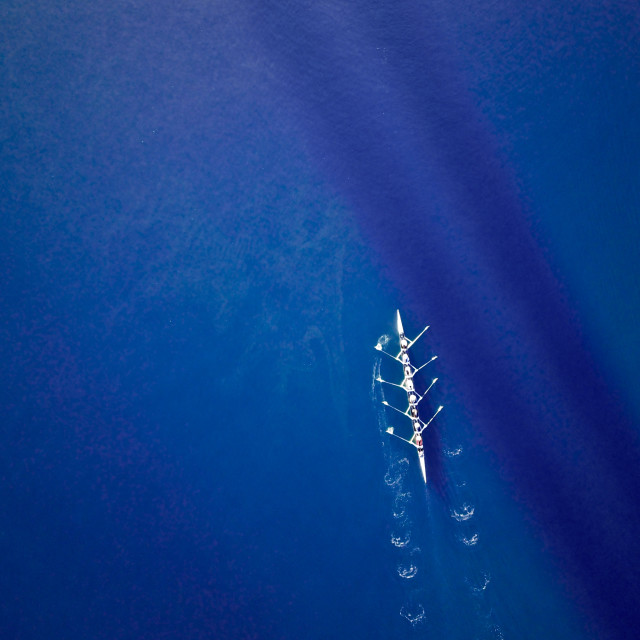 "Teamwork: Aerial rowing boat" stock image