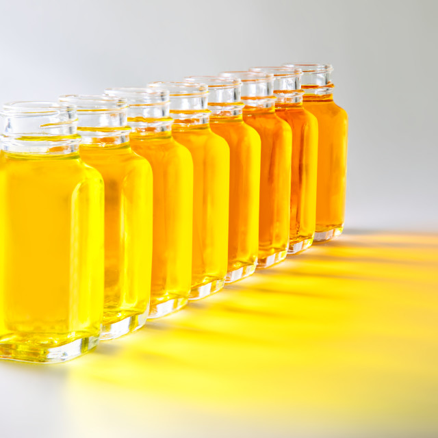 Download Bottles With Yellow Fluids With Different Shades Of Yellow License Download Or Print For 10 00 Photos Picfair Yellowimages Mockups