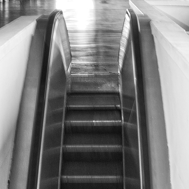"Escalator in black and white" by JOHN MOUNT - $25.14 "Escalator in black and white" stock image