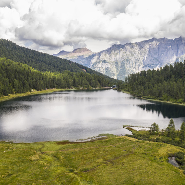 "aerial view of a mountain lake in the Dolomites with refuge amon" stock image