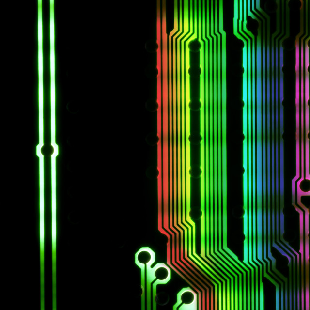 "Multicolored tracks on an electronic circuit board" stock image