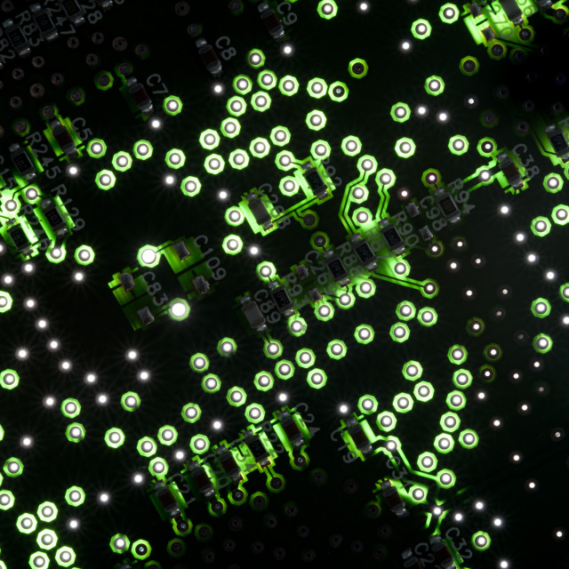 "Electronic printed circuit board in green light" stock image