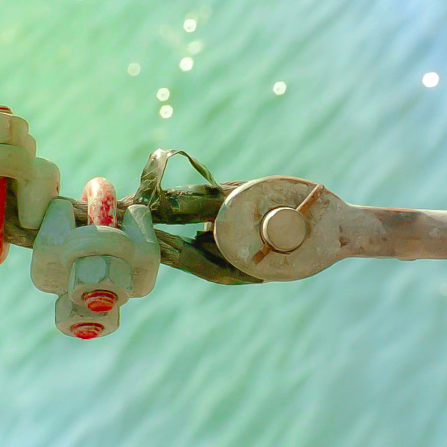 "Bolt, clamps and cable on a fishing boat" by JOHN MOUNT - $25.14 "Bolt, clamps and cable on a fishing boat" stock image