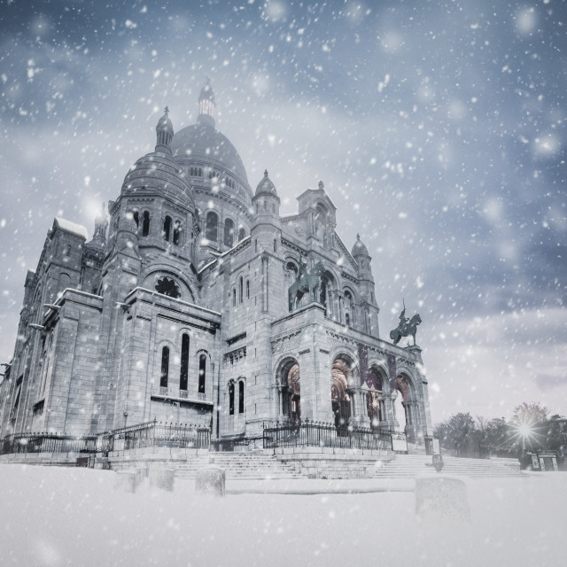 "Snow at The Basilica of the Sacred Heart (Sacre Cœur Basilica). Montmartre, Paris, France" stock image