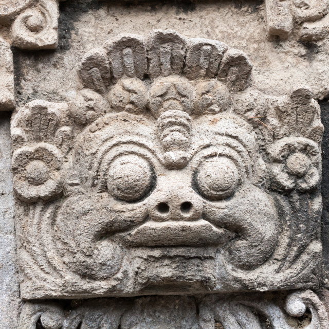 "Stone carving outside a Balinese Hindu village temple" stock image