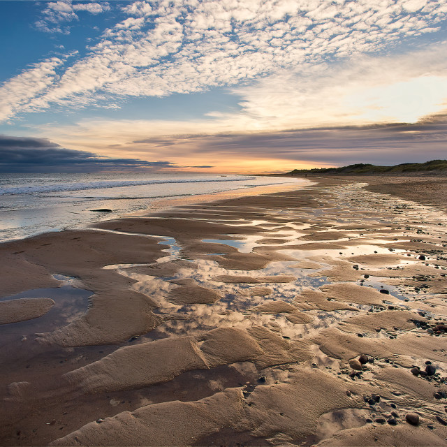 "December sunrise at Druridge Bay in Northumberland" stock image