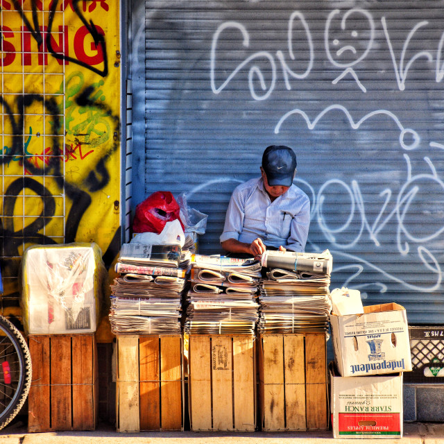 "Selling Papers on the Street" stock image