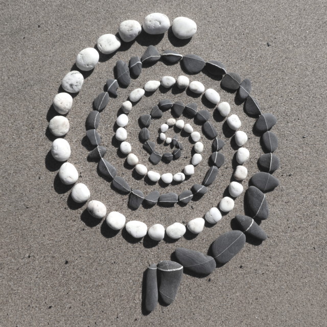 "beach pebble double spiral" stock image