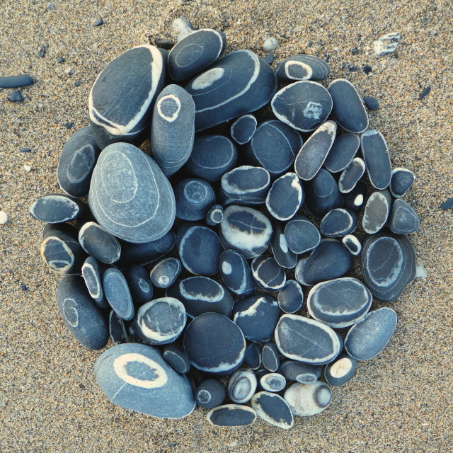 "beach pebble circles" stock image