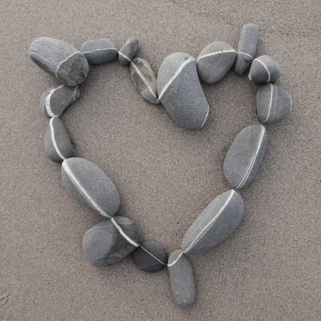 "heart from beach stones" stock image