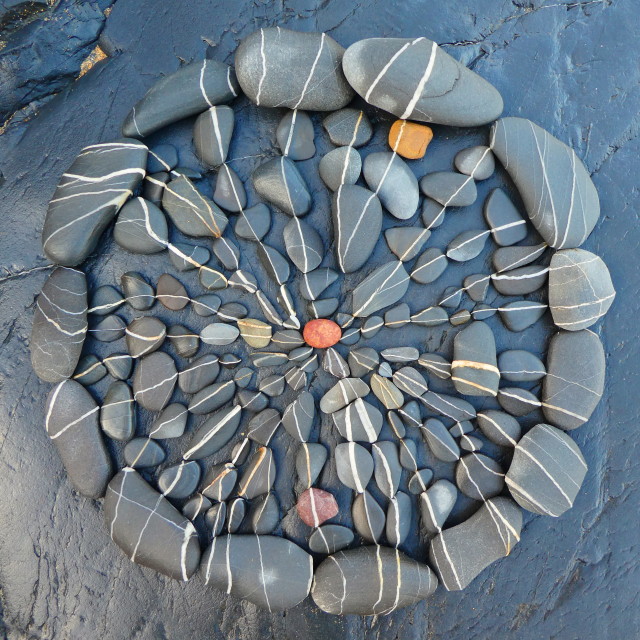 "circle mandala from beach pebbles" by Lucia Pec - $12.67 "circle mandala from beach pebbles" stock image
