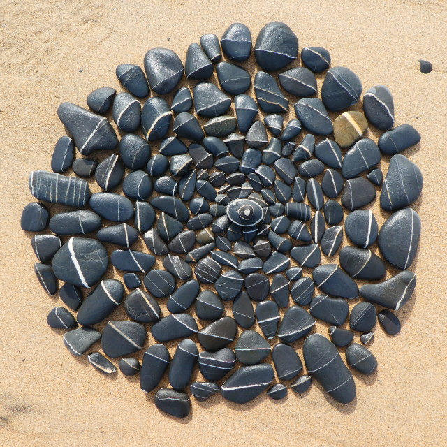 "stone circles from beach pebbles" stock image