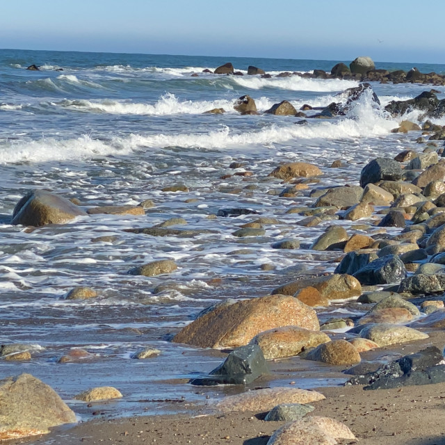 "Saquish beach splashing waves" stock image