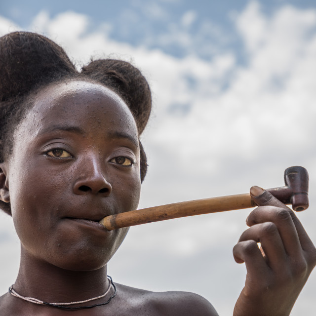 "Nguendelengo woman smoking" by Anibal Bueno - $12.20 "Nguendelengo woman smoking" stock image