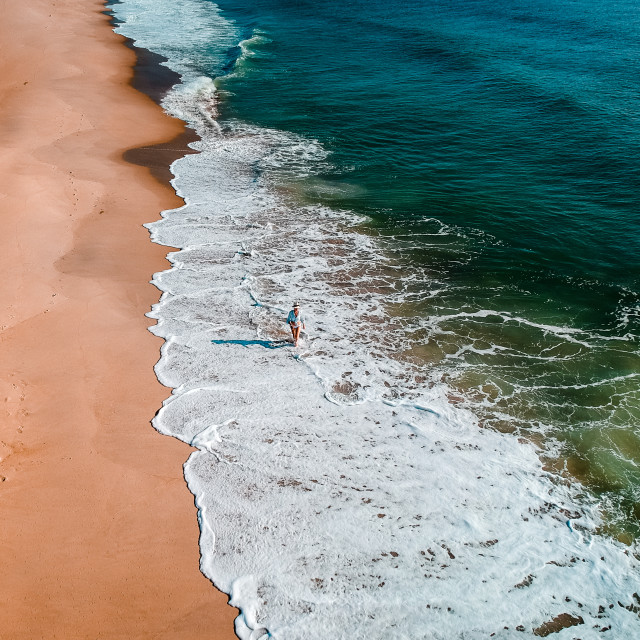 "Lone Woman on the Beach" stock image