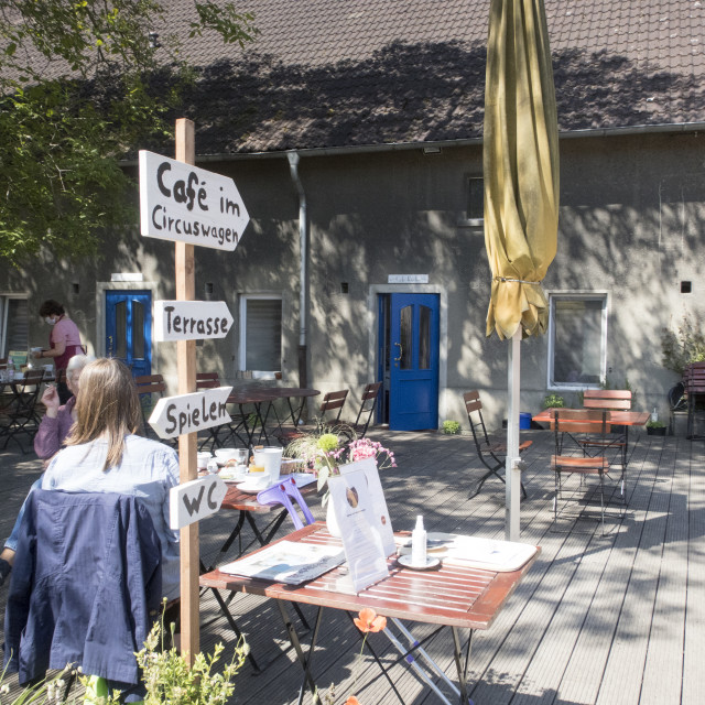 "social distancing in a café" stock image