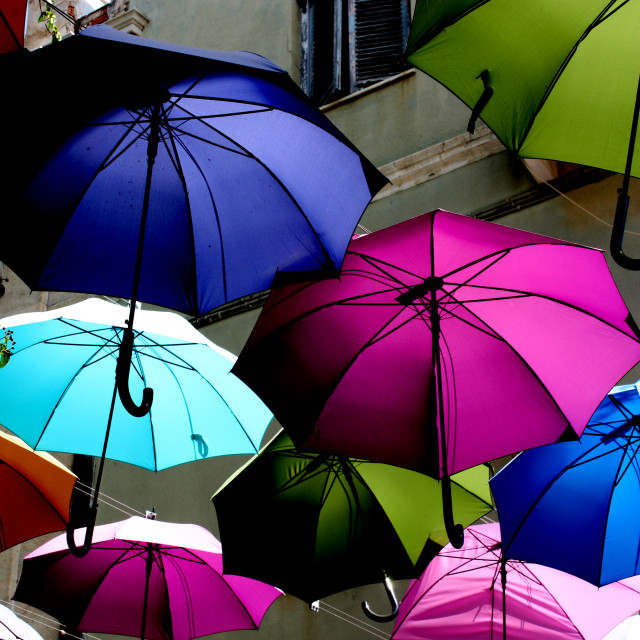 "Umbrellas on a street in Ermoupoli on Syros" by Julian Worker - £5.00 "Umbrellas on a street in Ermoupoli on Syros" stock image