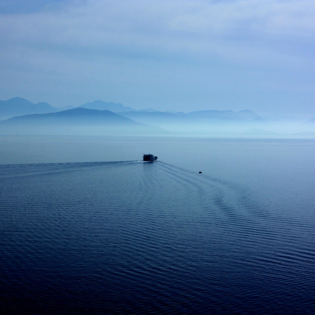 "Small ferry heading southwards away from Corfu" by Julian Worker - £5.00 "Small ferry heading southwards away from Corfu" stock image