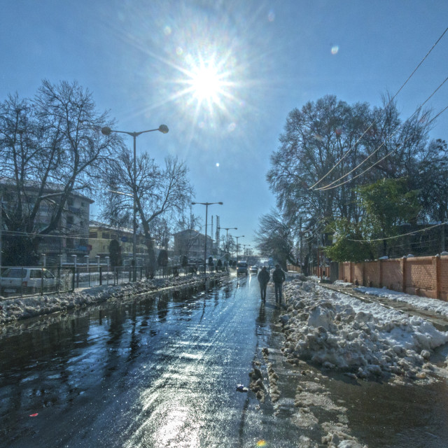 "A ROAD FLOODED WITH MELTING SNOW" stock image